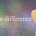 Hand holding a beige paper heart on the right with the phrase "make a difference" across a textured multicolor background.